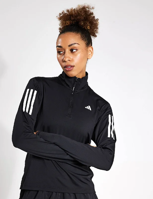 Own the Run Half-Zip Jacket - Black Chic And Edgy