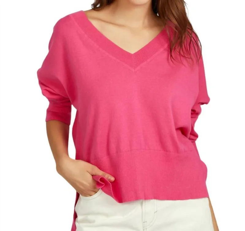 Noor Oversized V-Neck Pullover In Shocking Pink Wardrobe Essentials