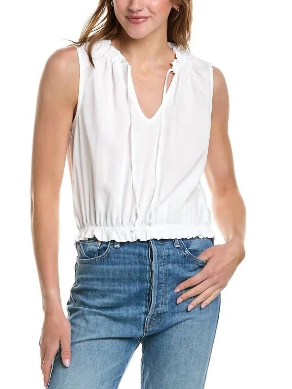 Sleeveless Ruffle Edge Pullover Top In White Graceful Movement