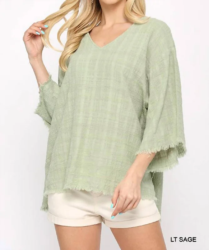 Woven V-Neck With Frayed Hem In Sage Effortless Style