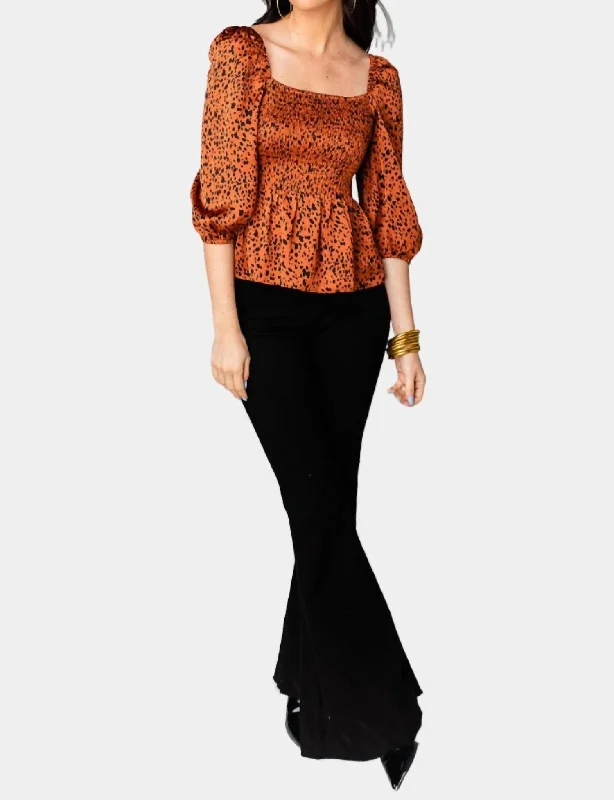 Gwendolyn Peplum Top In Cognac Elevated Style